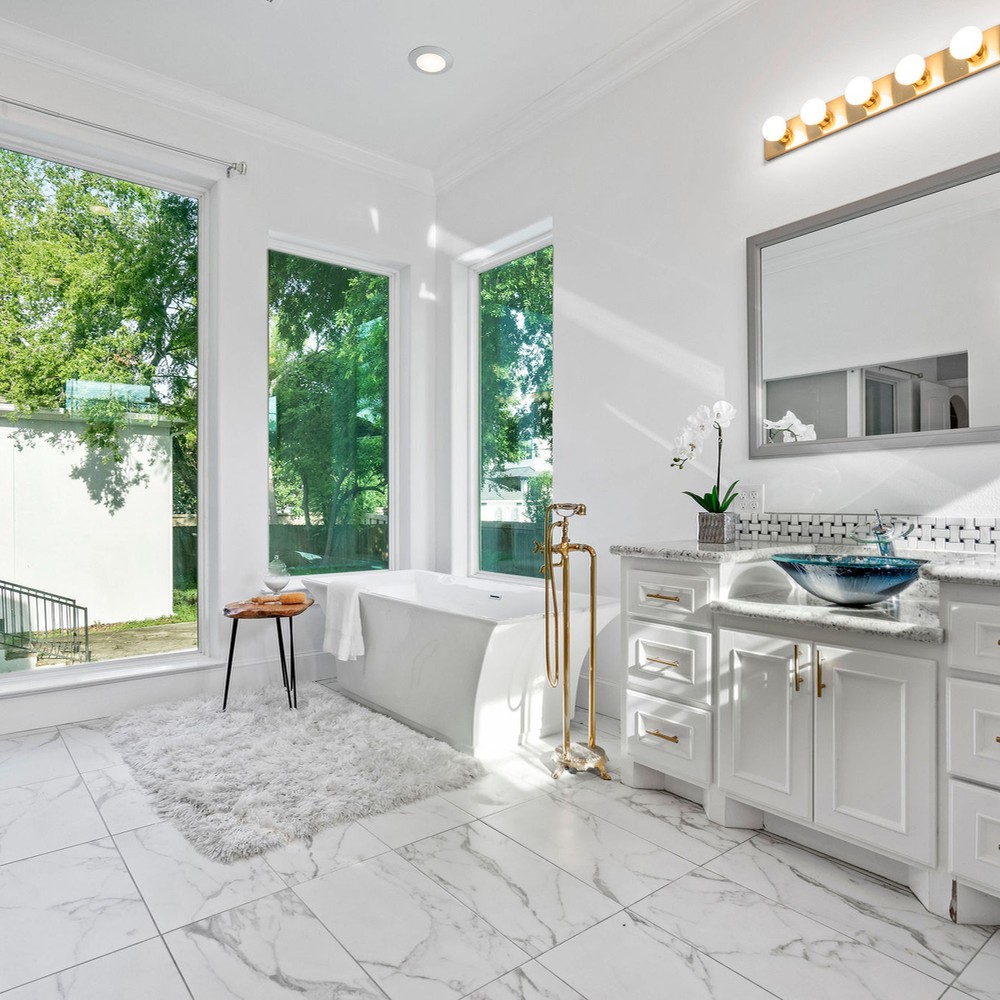 Primary bathroom with free standing tub.