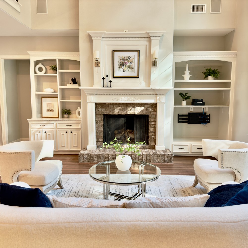 Vacant home staging living room with fireplace in Spring, TX.