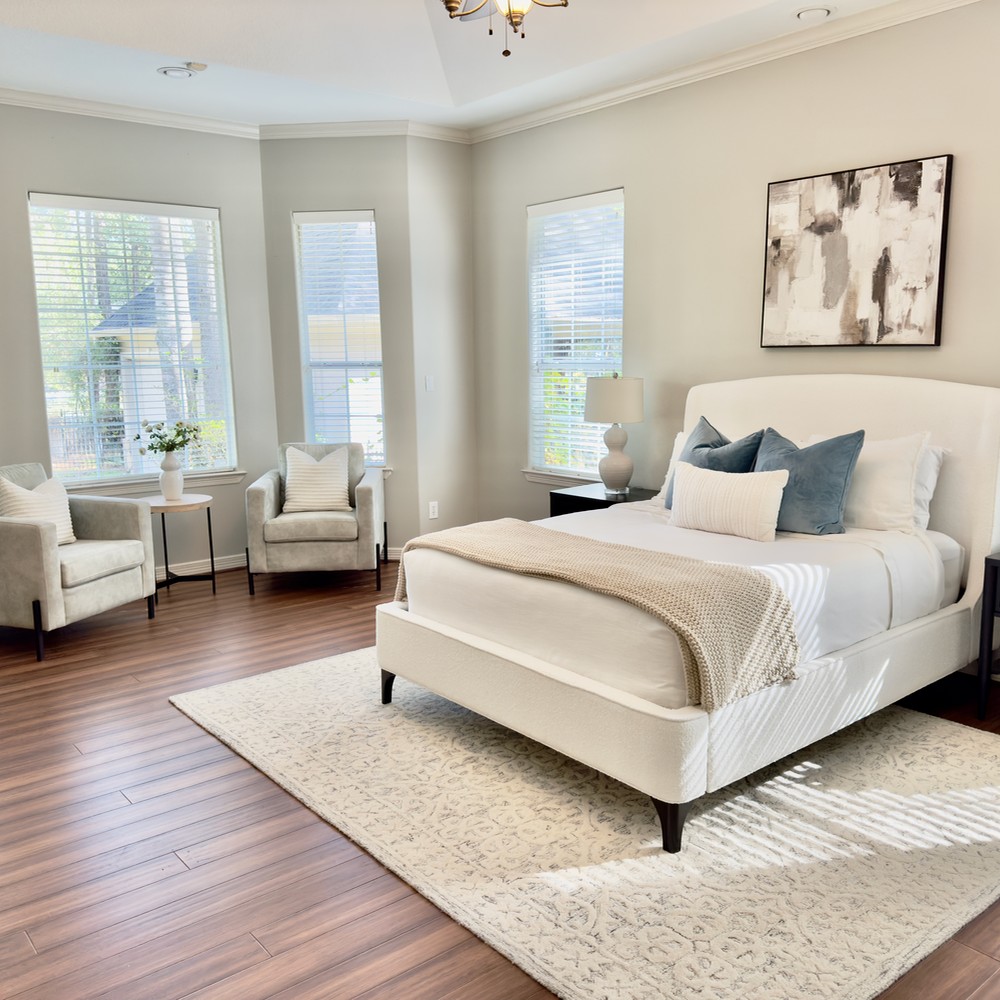Vacant home staging primary bedroom in Spring, TX.